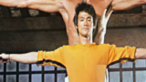 Kareem Abdul Jabar and Bruce Lee in Karate poses
