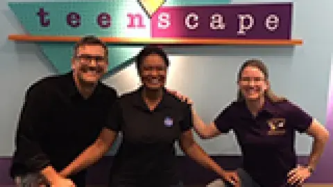 3 jpl scientists in front of teenscape sign