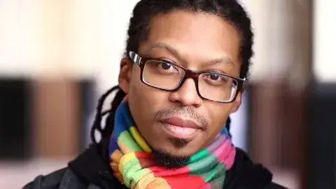 Nathan McClain in a colorful scarf
