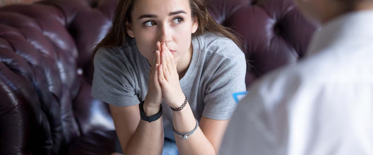 teen girl looking concerned