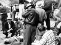 A close-up shot is lined up by the director and cameraman during a Maverick shoot on the Warner Bros. lot in Burbank, [1961]. Valley Times Collection