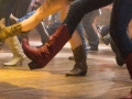 dancing legs in jeans and cowboy boots