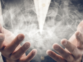 Image of hands holding smoke