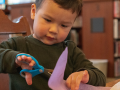 child cutting paper