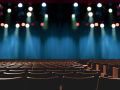 empty theater with stage lights on