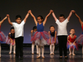 image of kids on a stage