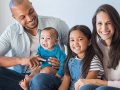 Mother and father sitting with children