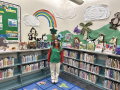 Picture of star reader standing in the children's area