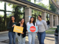 College-Bound Teens Holding 826LA Signs