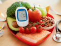 healthy foods and a stethescope and heart monitor