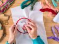 Two hands embroidering