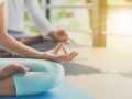 Photo of person in seated yoga position. 
