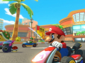 Mario kart characters racing on a track.