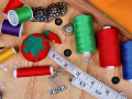 An assortment of sewing materials and tools.
