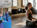 Two photos of students in a yoga class. 
