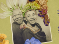 Photograph of couple, adorned with flowers