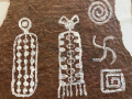 Painted paper with rock art designs