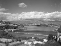 reservoir with mountains and clouds