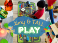 children playing with light tables and toys, play kitchen, magnatiles, art station, and car town
