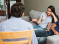 A family of four having a discussion