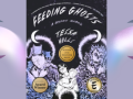 Cover of Feeding Ghosts book flanked by crescent moons and glowy halo