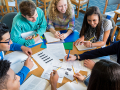 A group of teen students studying