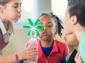 Kids doing a science experiment.