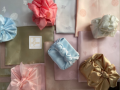 six wrapped presents in the style of bojagi